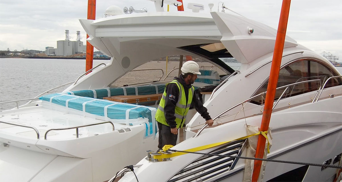 Engineer inspecting a yacht control panel